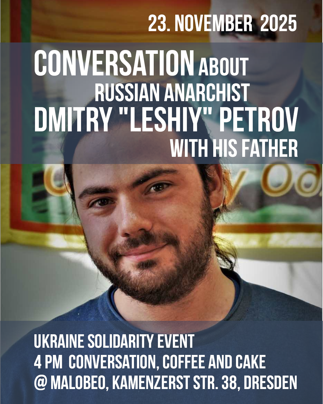 Dimitri Petrow in front of a picture of Ocalan Text Conversation about russian anarchist Dmitry "Leshiy" Petrov with his father
